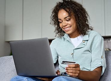 young-adult-african-american-girl-sitting-indoors-2021-09-07-20-37-11-utc