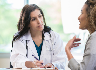 A patient shares her medical history with a doctor