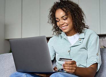 young-adult-african-american-girl-sitting-indoors-2021-09-07-20-37-11-utc